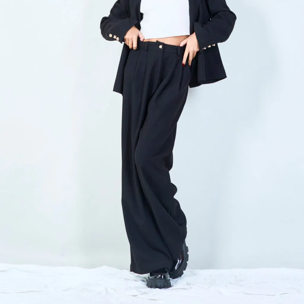 High-waist pleated trousers with decorative button wholesale